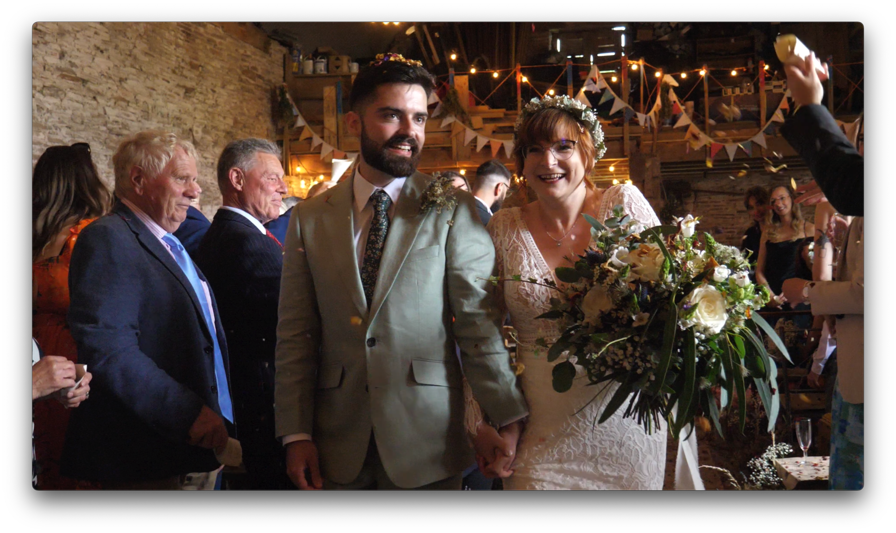 Bride and Groom walking down isle